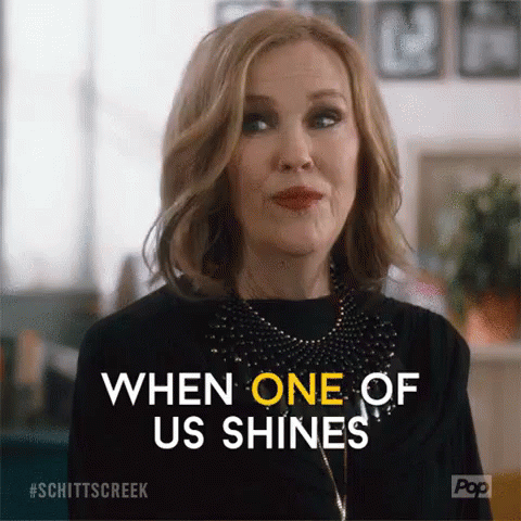 Animation of Catherine O'hara saying 'when one of us shines, all of us shine' (subtitled)